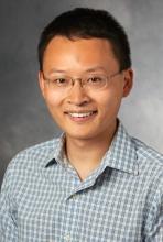 James Zou headshot against gray background